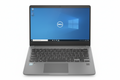 A silver Dell laptop with a black keyboard and trackpad, shown open against a solid white background. The screen displays the Windows desktop with the Dell logo visible.